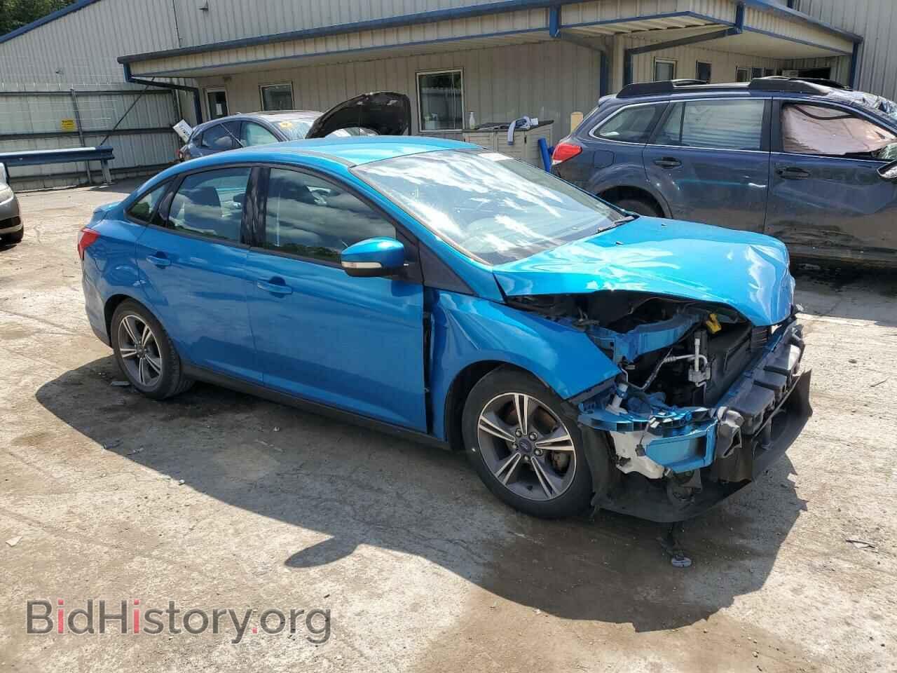 2014 FORD FOCUS - VIN: 1FADP3F20EL404595 - Photo 4
