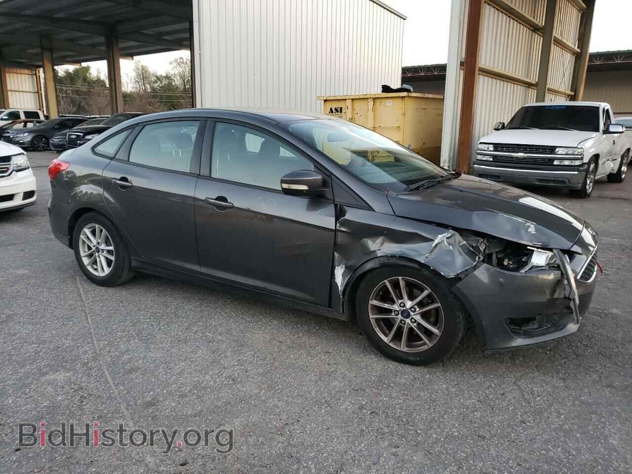 2015 FORD FOCUS - VIN: 1FADP3F21FL214872 - Photo 4