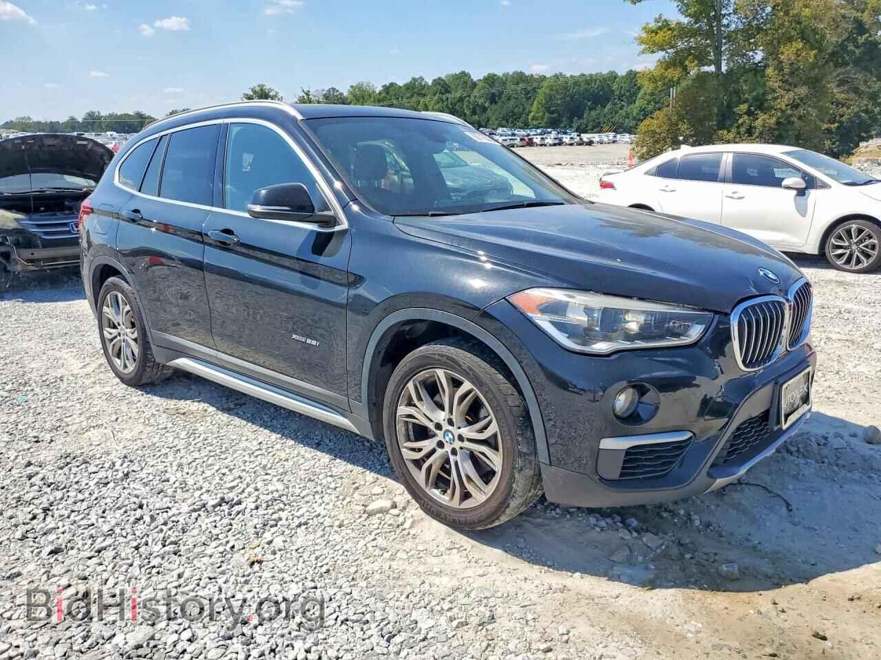 2016 BMW X1 - VIN: WBXHT3C36G5E49171 - Фото 4
