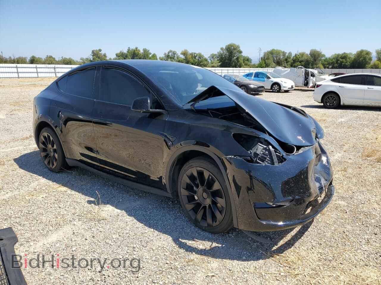 2023 TESLA MODEL Y - VIN: 7SAYGAEE4PF897802 - Photo 4