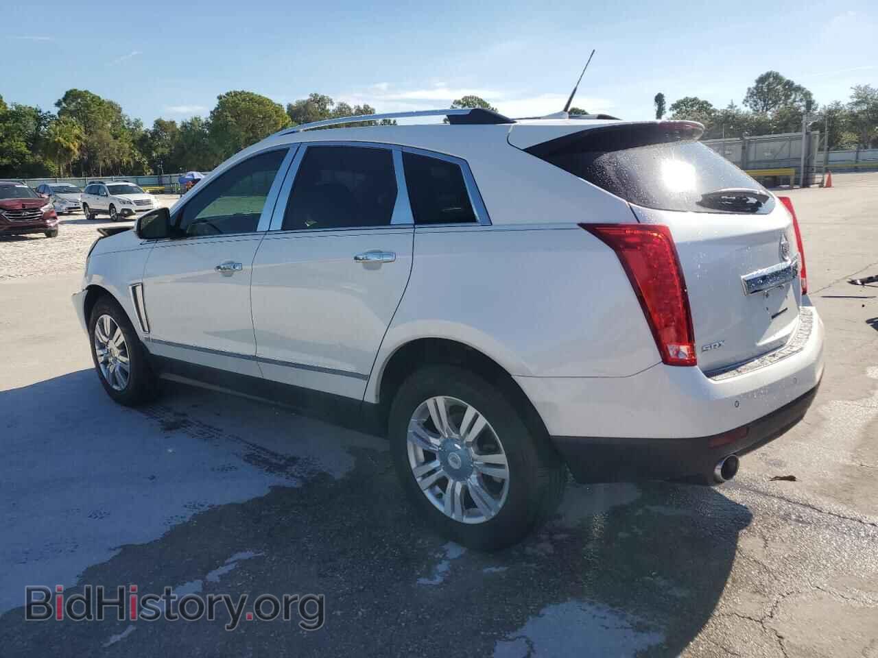 2013 CADILLAC SRX - VIN: 3GYFNCE32DS595586 - Фото 2