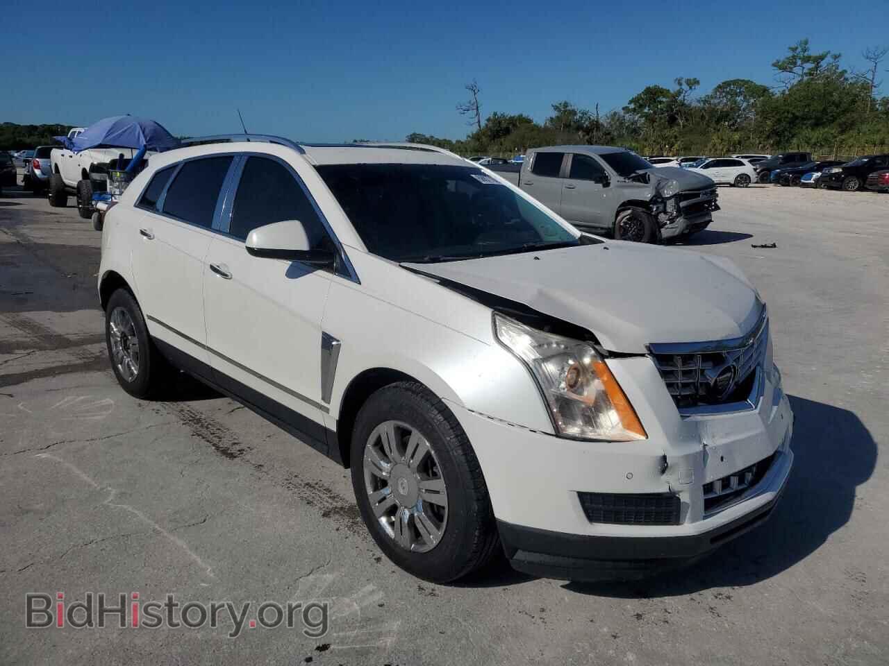 2013 CADILLAC SRX - VIN: 3GYFNCE32DS595586 - Фото 4