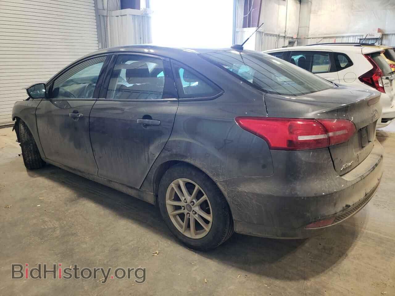 2016 FORD FOCUS - VIN: 1FADP3F29GL386228 - Фото 2