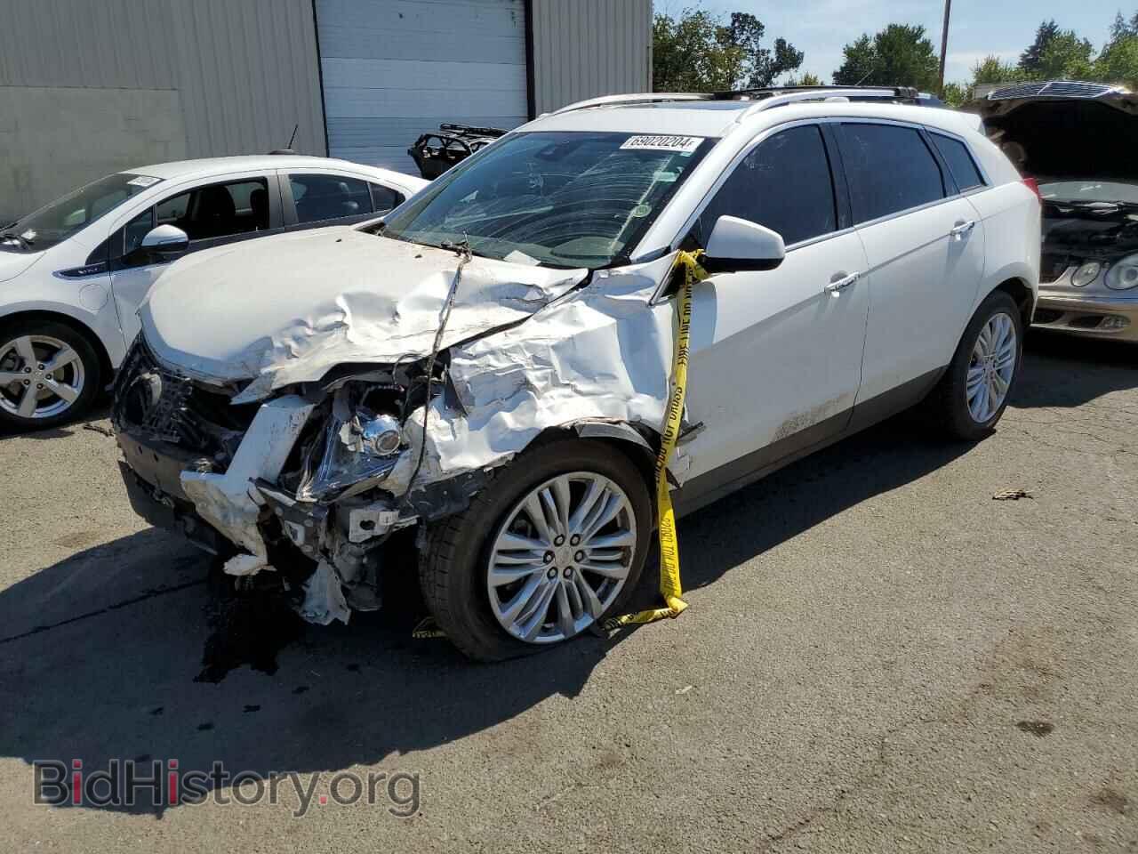 Фотография 3GYFNCE3XGS520008 - CADILLAC SRX 2016