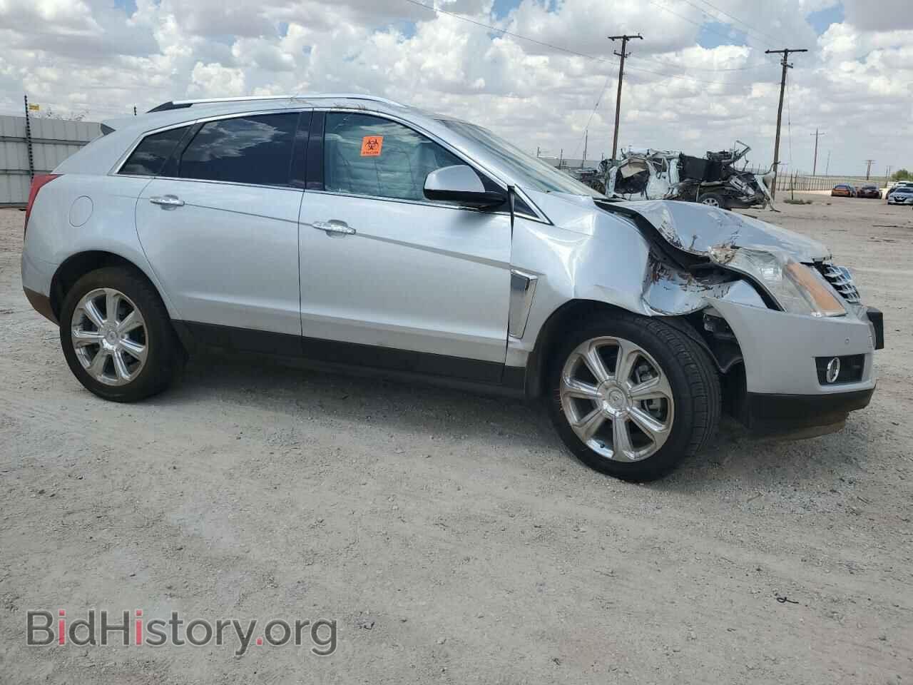 2014 CADILLAC SRX - VIN: 3GYFNCE36ES520276 - Photo 4