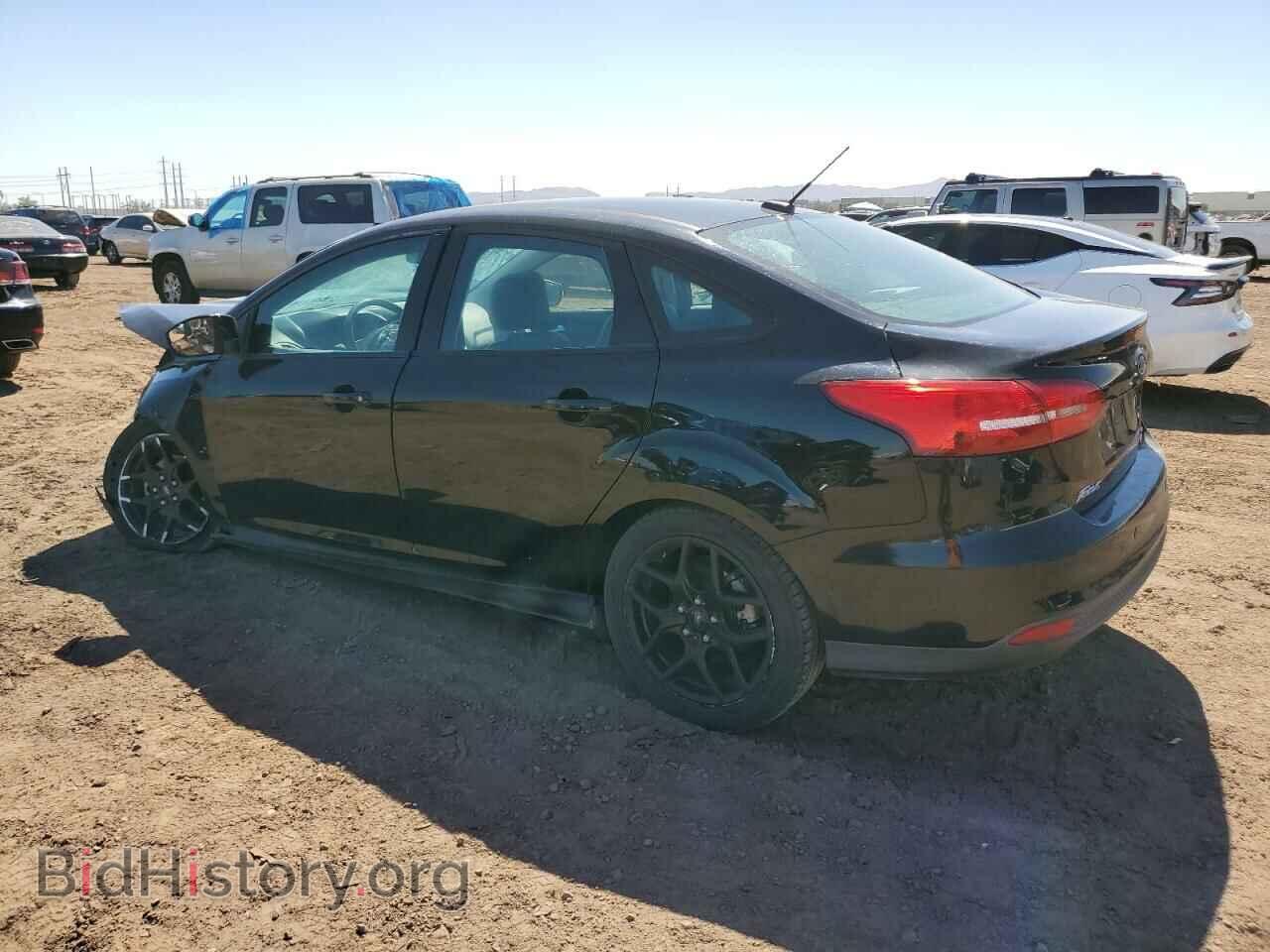 2016 FORD FOCUS - VIN: 1FADP3F21GL295132 - Фото 2