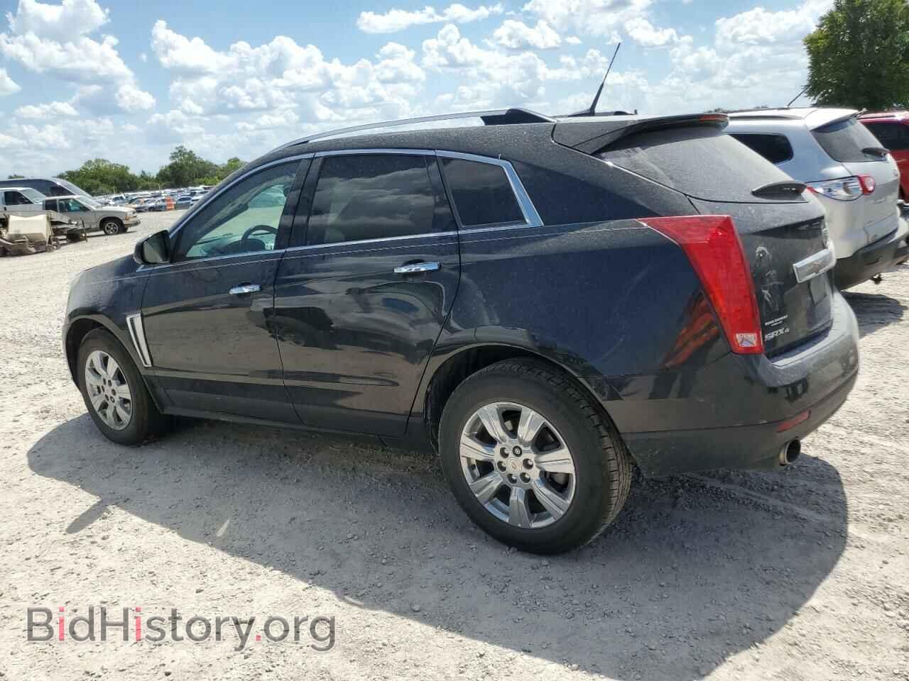 2014 CADILLAC SRX - VIN: 3GYFNEE3XES598037 - Фото 2