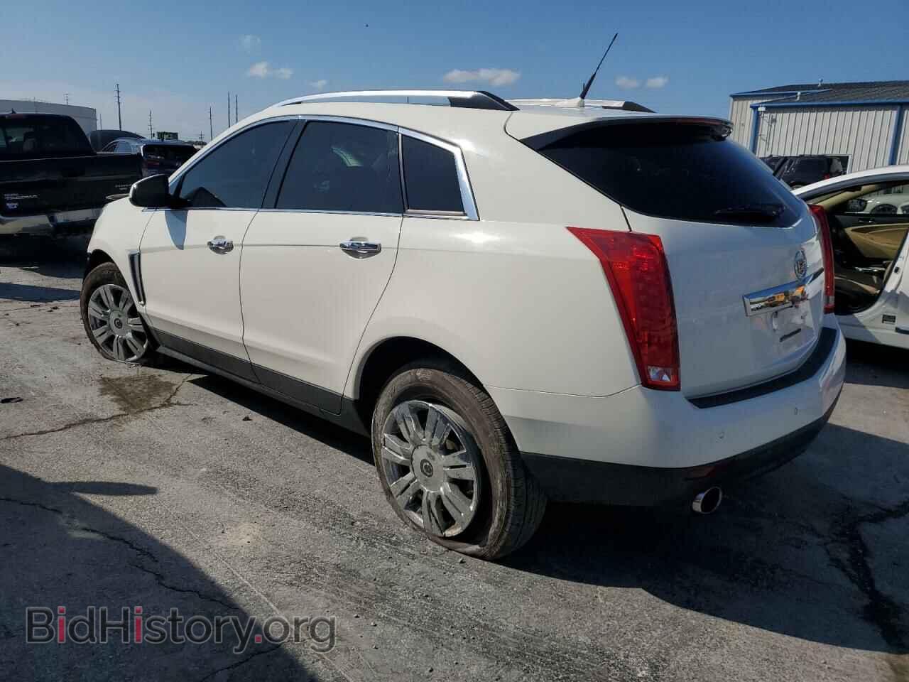 2014 CADILLAC SRX - VIN: 3GYFNBE37ES543074 - Фото 2