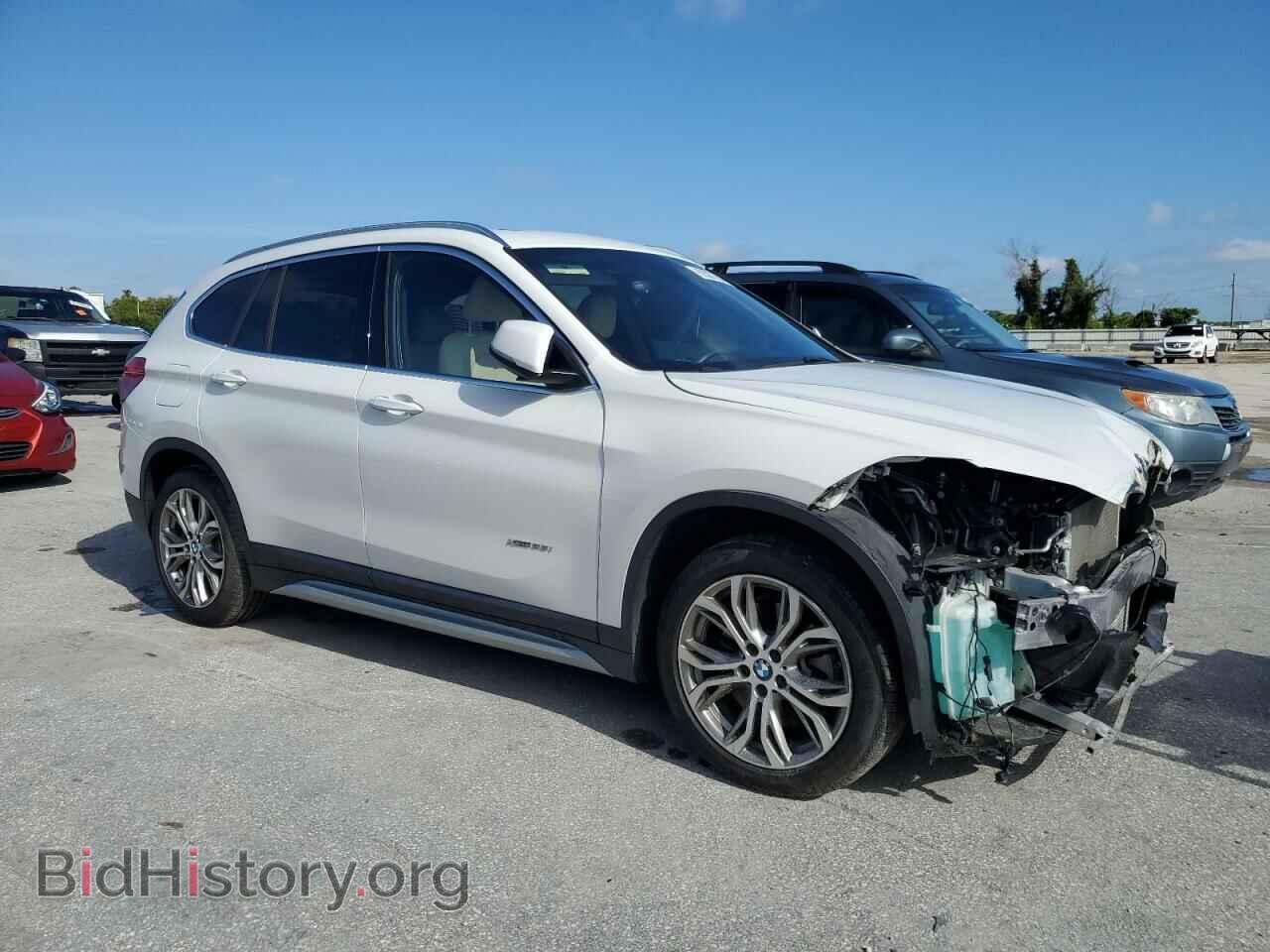 2016 BMW X1 - VIN: WBXHT3Z37G4A50931 - Фото 4