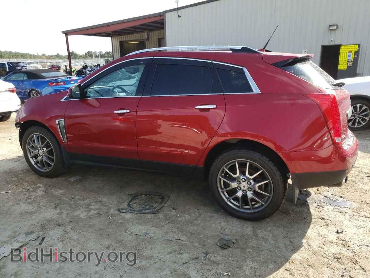 2014 CADILLAC SRX - VIN: 3GYFNFE39ES677110 - Фото 2