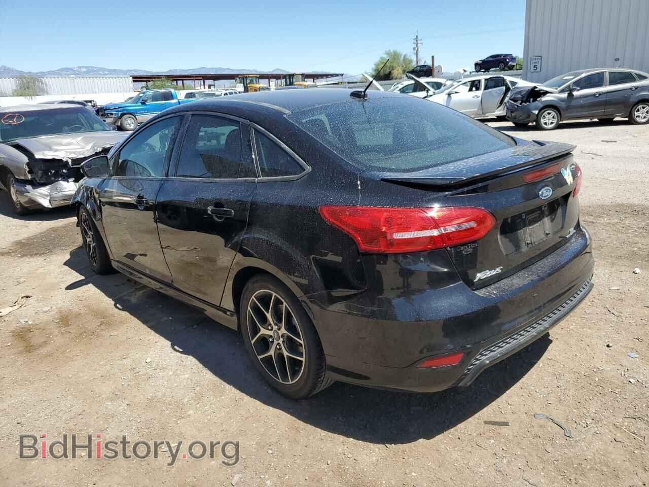 2016 FORD FOCUS - VIN: 1FADP3F20GL282503 - Фото 2
