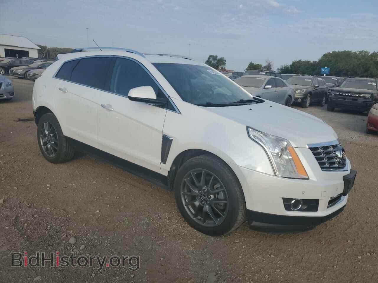 2016 CADILLAC SRX - VIN: 3GYFNCE38GS559177 - Фото 4