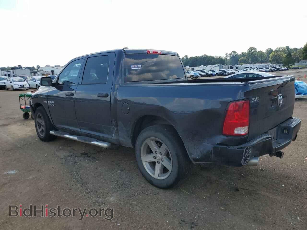 2014 RAM 1500 - VIN: 1C6RR6KT1ES457698 - Фото 2