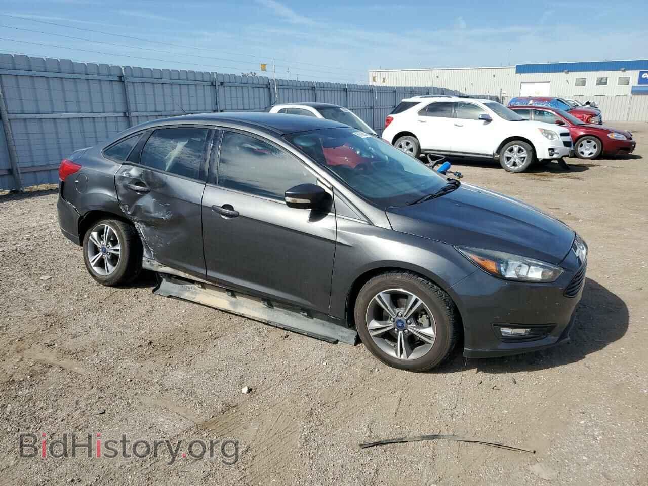 2017 FORD FOCUS - VIN: 1FADP3FE3HL309916 - Photo 4