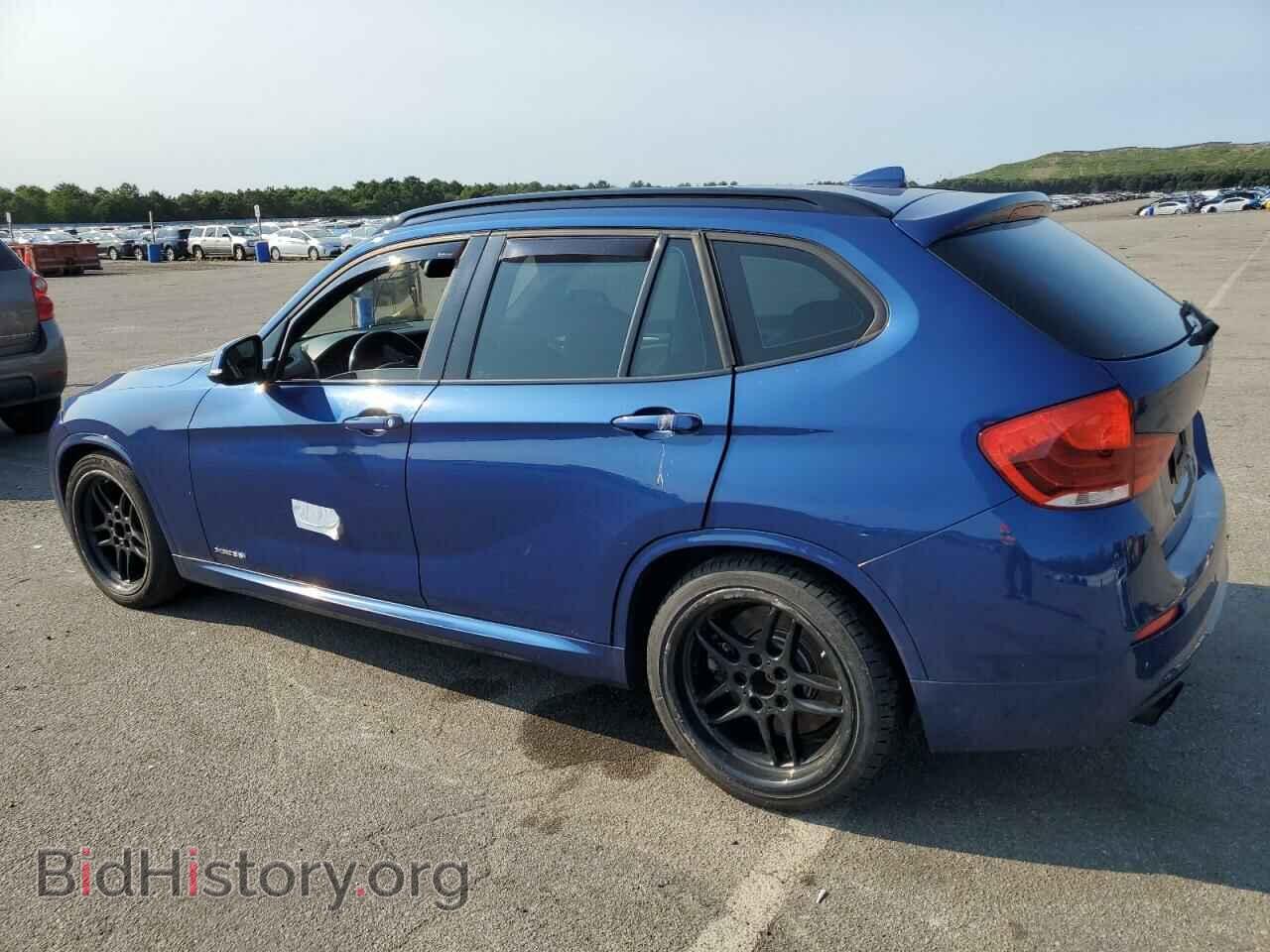 2014 BMW X1 - VIN: WBAVM5C59EVV93251 - Фото 2