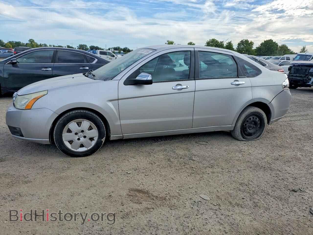 Photo 1FAHP35N09W215365 - FORD FOCUS 2009