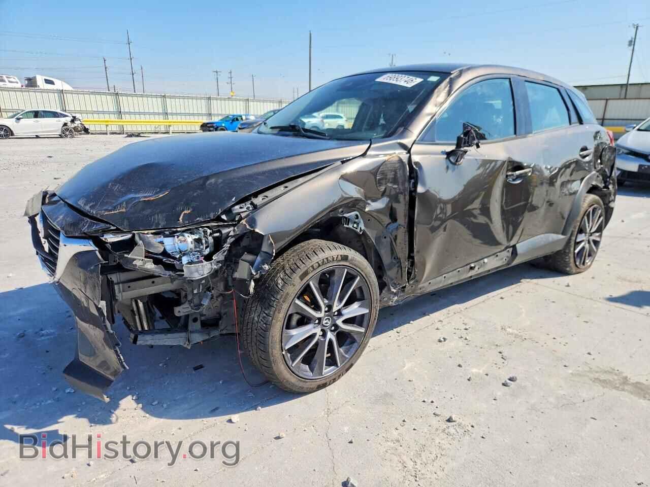 2018 Mazda CX-3 Touring (VIN JM1DKFC77J0319047) — photo 1 of 15, Copart, damage: front end