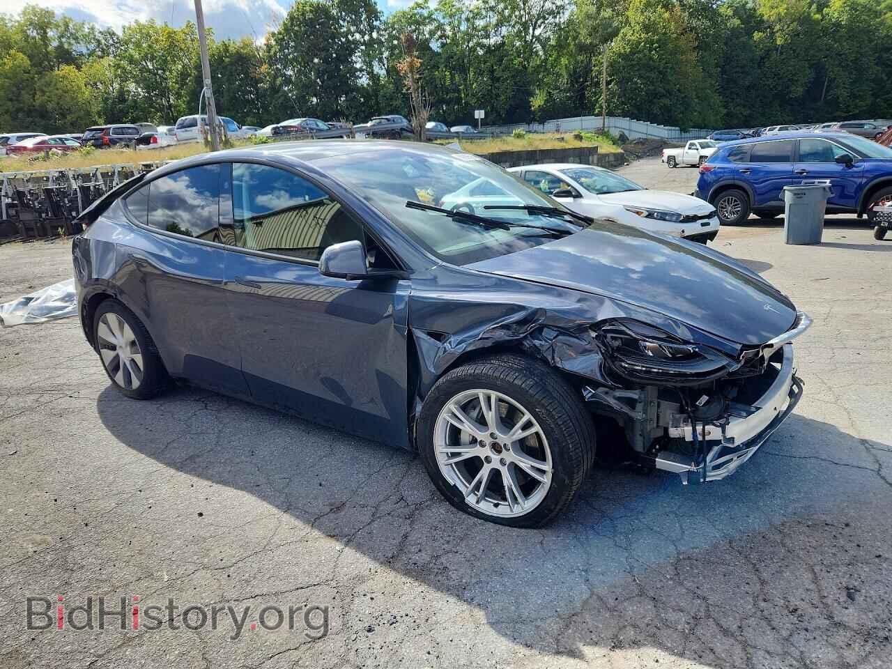 2023 TESLA MODEL Y - VIN: 7SAYGDEEXPA209302 - Photo 4