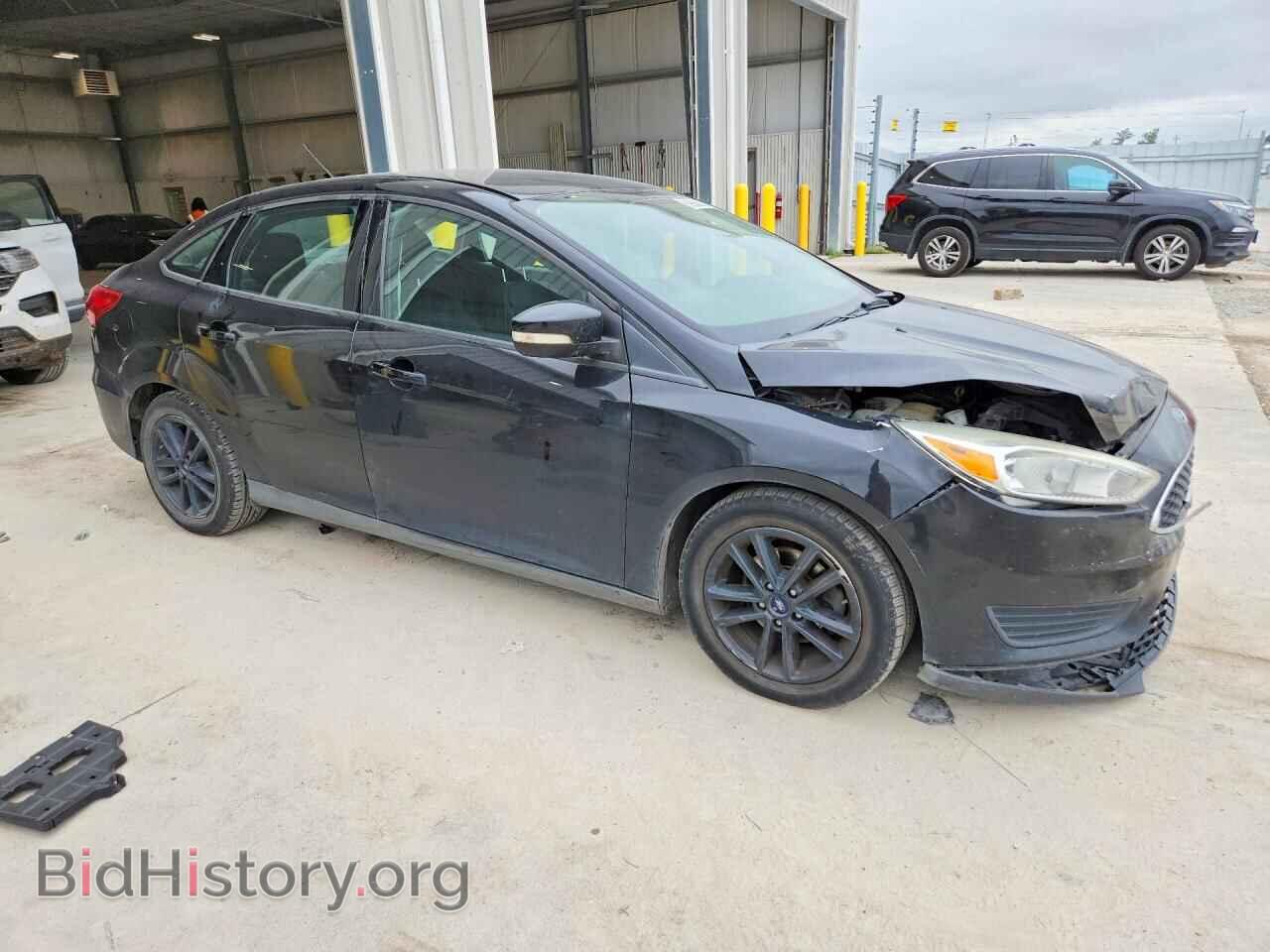 2016 FORD FOCUS - VIN: 1FADP3F21GL315055 - Photo 4