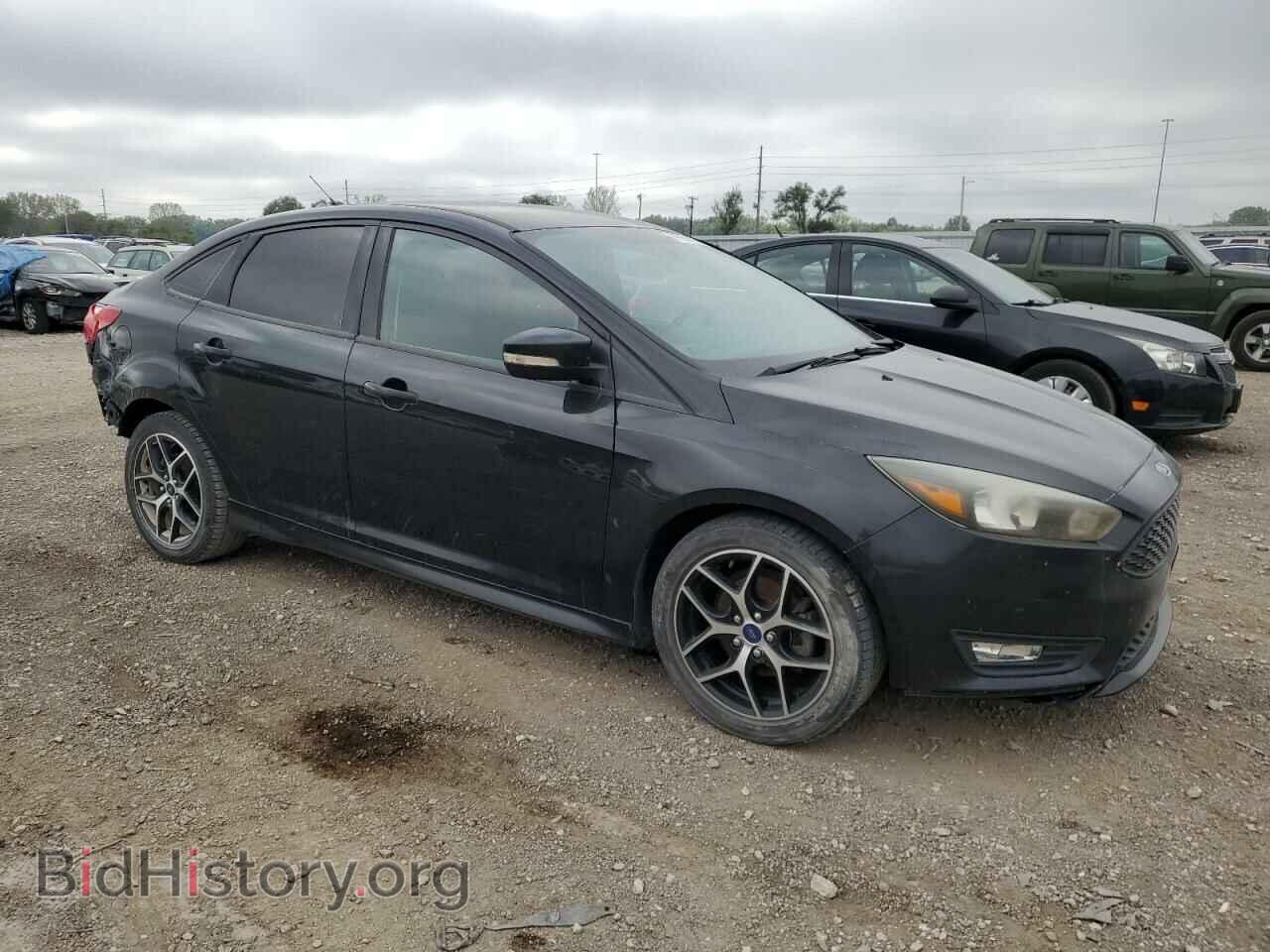 2015 FORD FOCUS - VIN: 1FADP3F20FL210568 - Photo 4