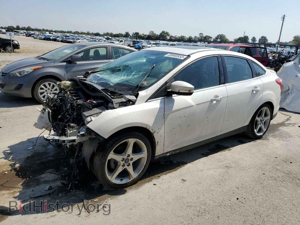 Фотография 1FADP3J28DL155999 - FORD FOCUS 2013