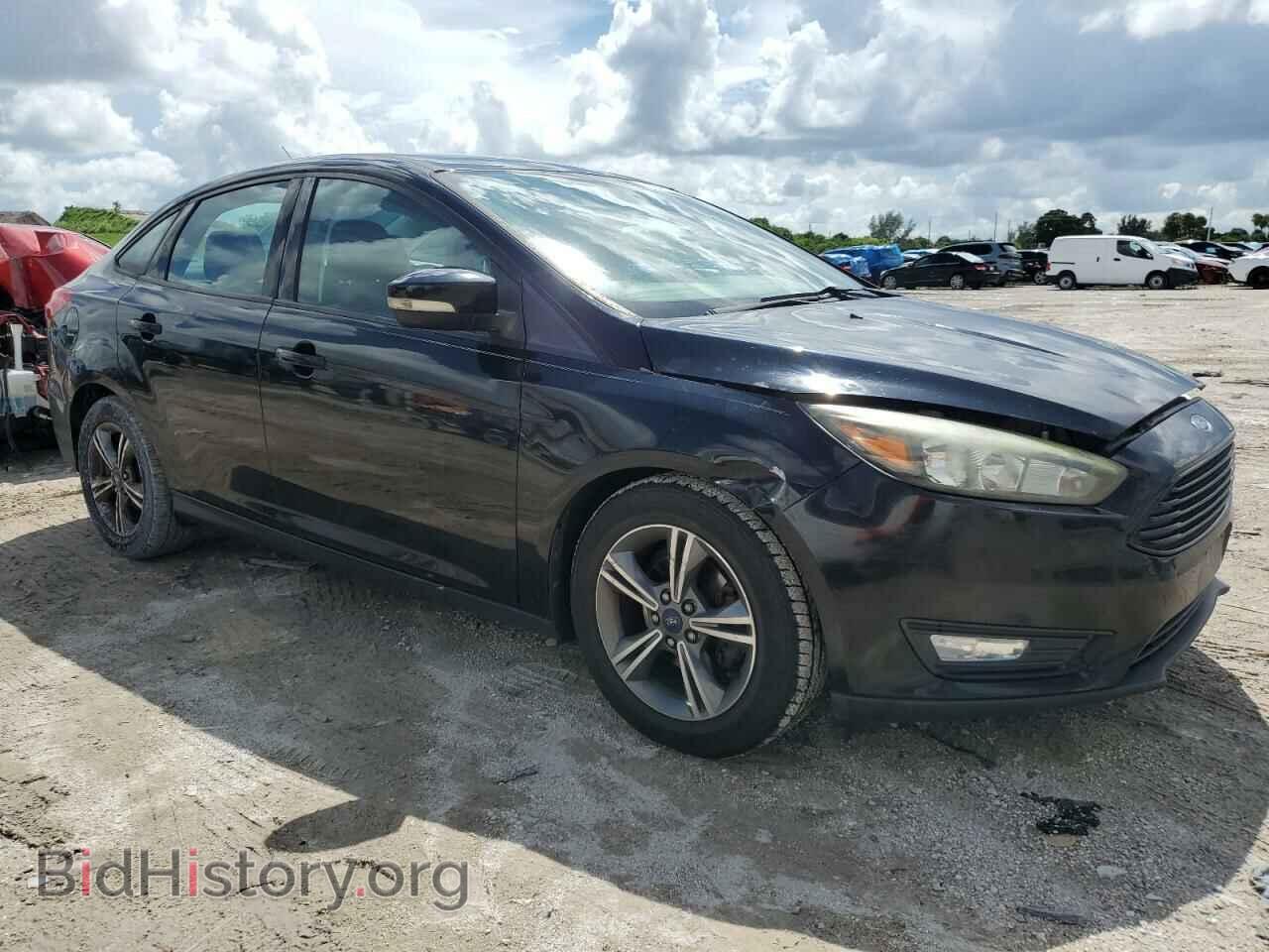 2017 FORD FOCUS - VIN: 1FADP3FE2HL242595 - Photo 4