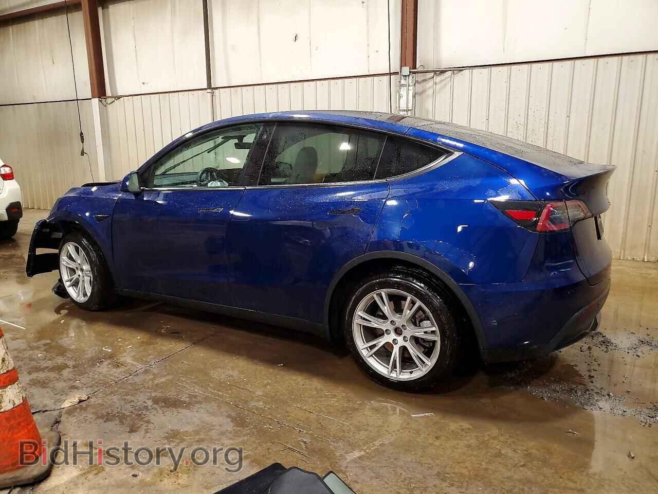 2023 TESLA MODEL Y - VIN: 7SAYGDEEXPF670986 - Фото 2