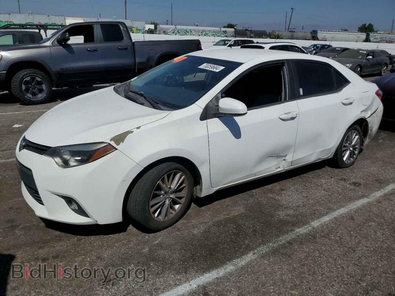 Фотография 5YFBURHEXEP137557 - TOYOTA COROLLA 2014