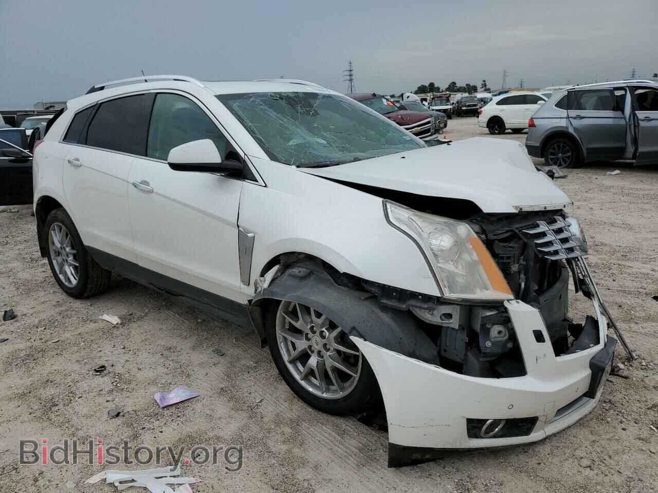 2014 CADILLAC SRX - VIN: 3GYFNDE32ES567049 - Фото 4