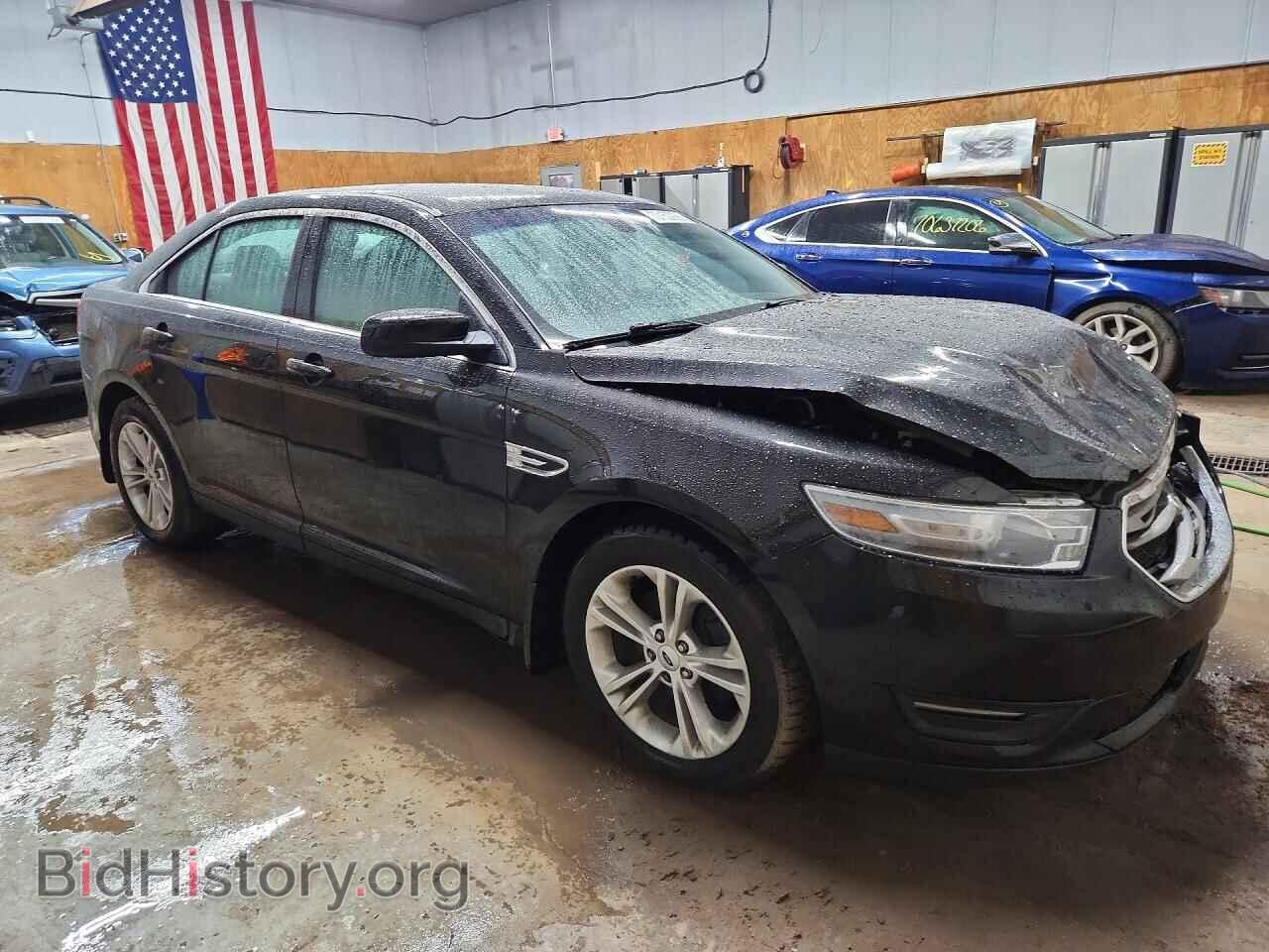 2014 Ford TAURUS (VIN 1FAHP2E91EG113008) — photo 4 of 14