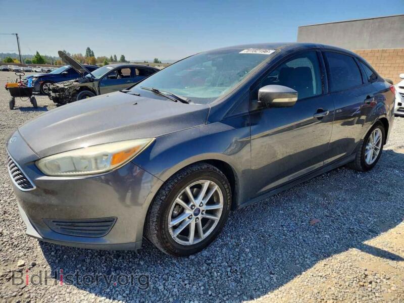 2015 Ford FOCUS SE (VIN 1FADP3F25FL262147) — photo 1 of 12, Copart, damage: side