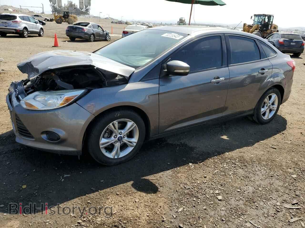 Фотография 1FADP3F28DL352941 - FORD FOCUS 2013