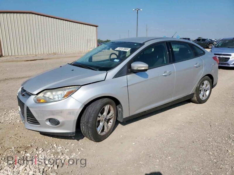 2014 Ford FOCUS SE (VIN 1FADP3F26EL321088) — фото 1 из 12, Copart, повреждение: бок