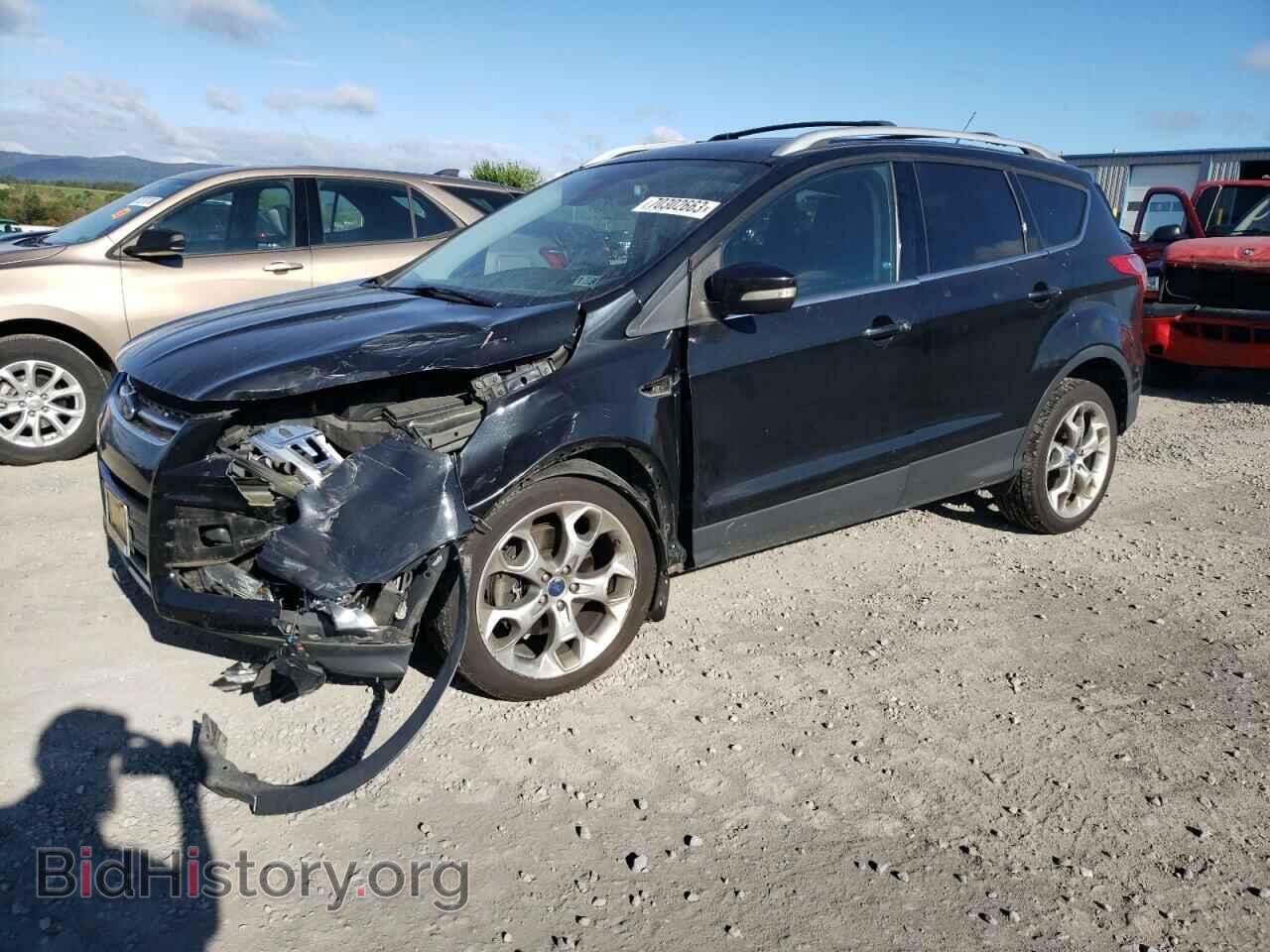 Фотография 1FMCU9J90EUA35779 - FORD ESCAPE 2014