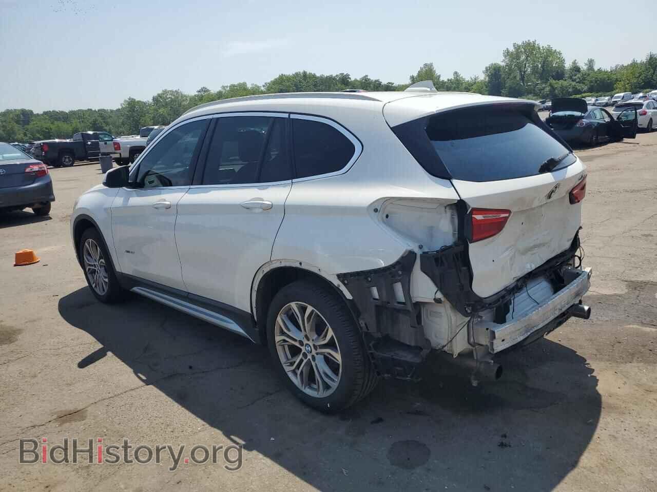 2017 BMW X1 - VIN: WBXHT3C36H5F84703 - Фото 2