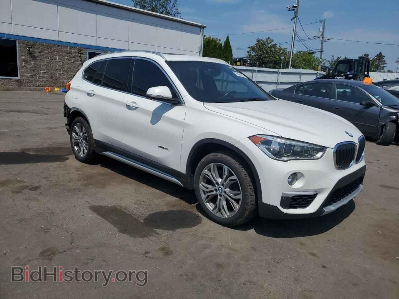 2017 BMW X1 - VIN: WBXHT3C36H5F84703 - Фото 4