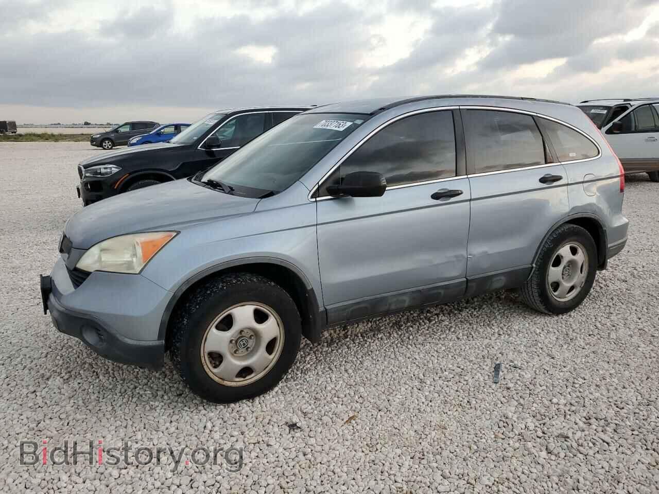 Фотография JHLRE38377C024235 - HONDA CRV 2007