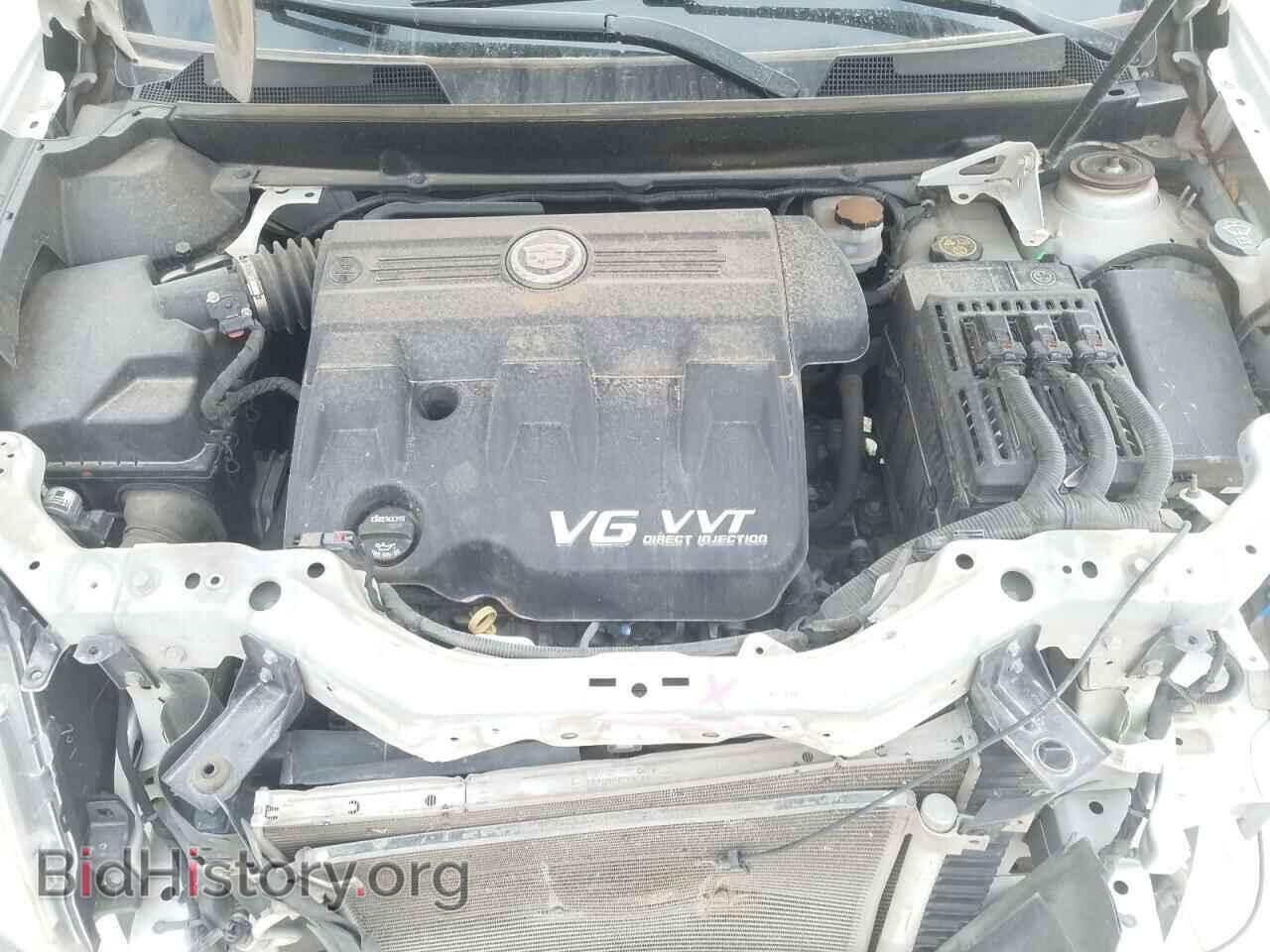 2014 CADILLAC SRX - VIN: 3GYFNCE33ES632002 - Photo 7