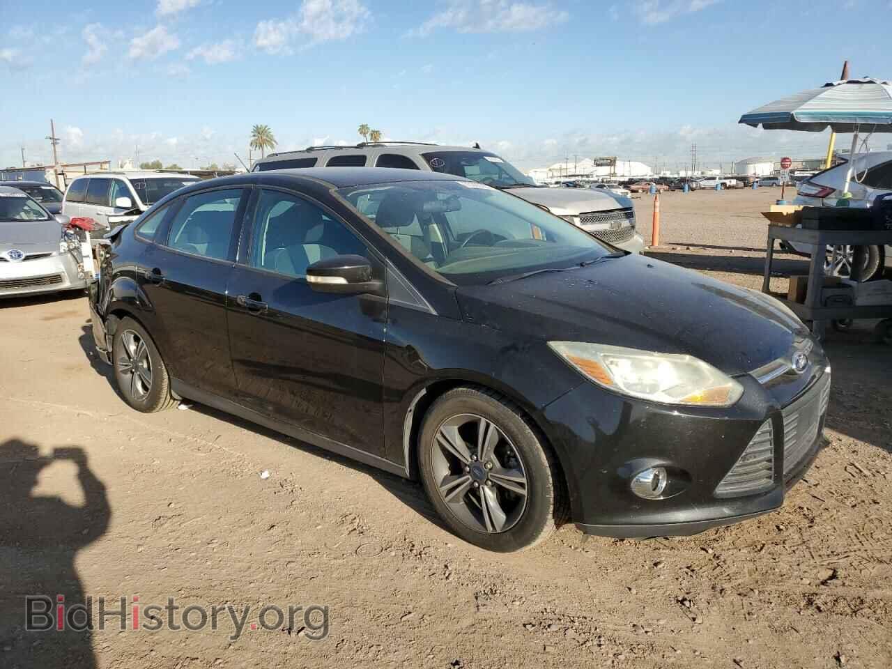 2014 FORD FOCUS - VIN: 1FADP3F21EL134955 - Photo 4