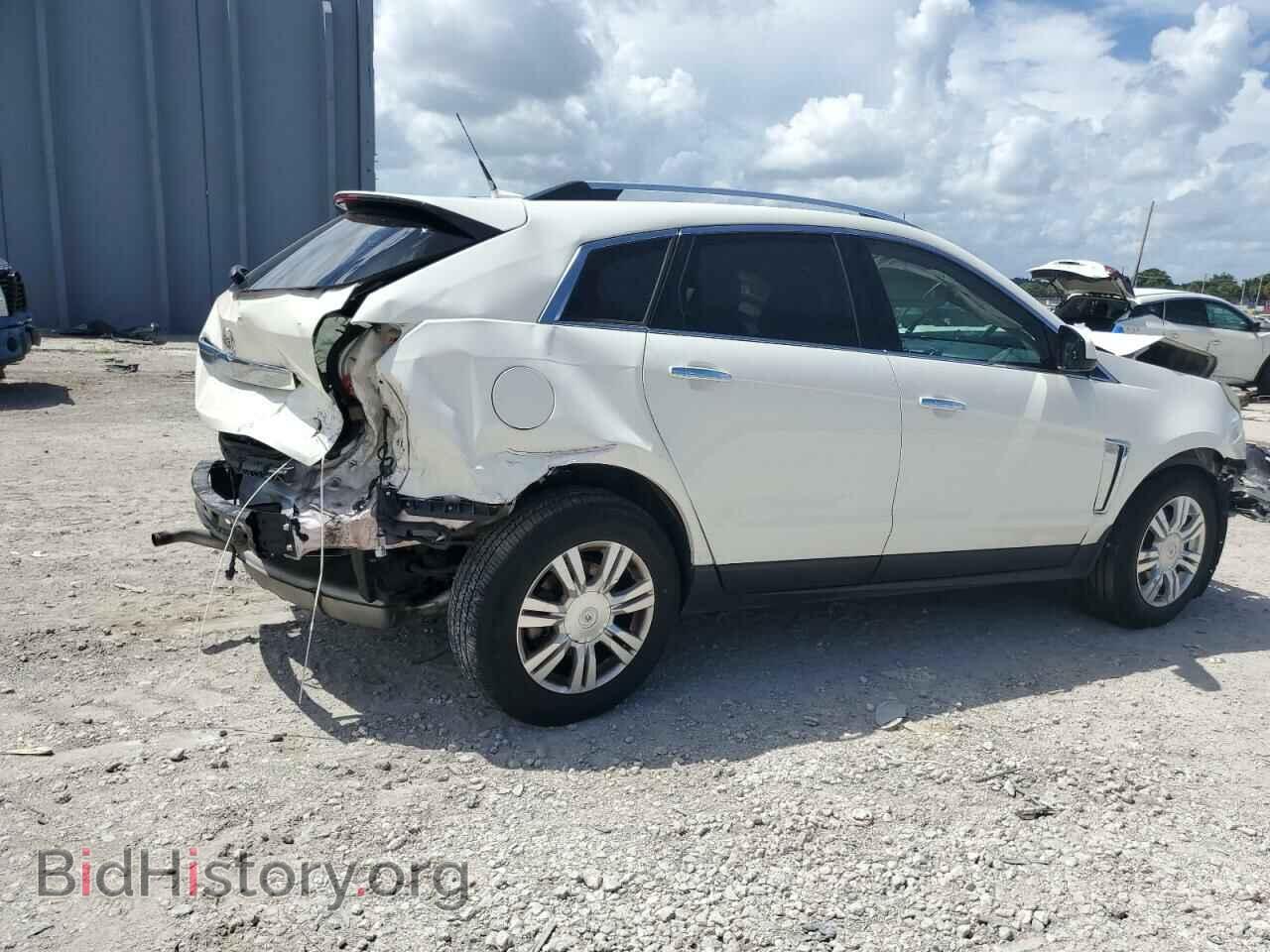 2013 CADILLAC SRX - VIN: 3GYFNCE31DS562417 - Фото 3