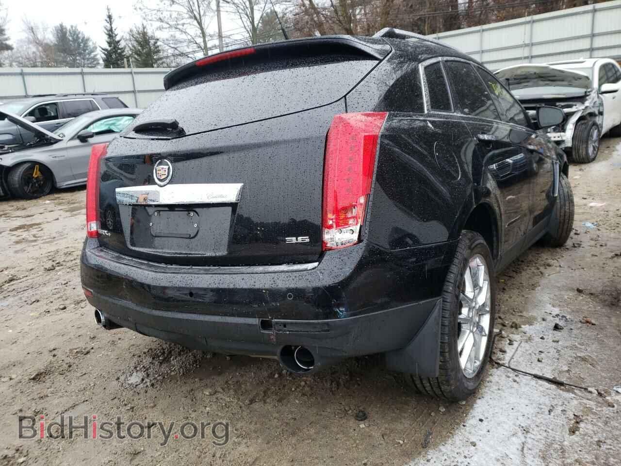 2014 CADILLAC SRX - VIN: 3GYFNGE3XES652366 - Фото 4