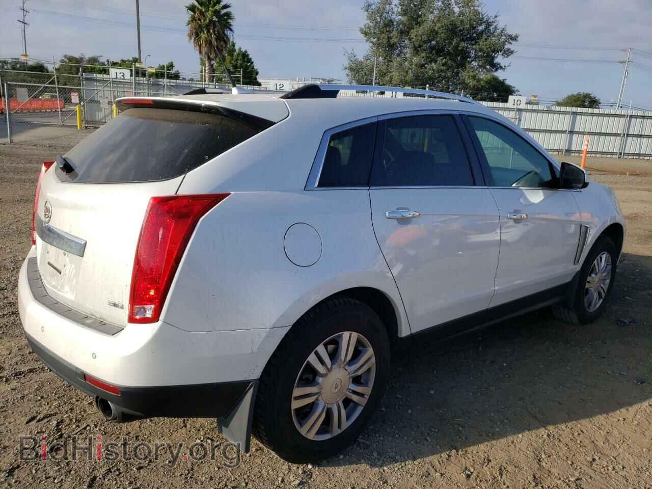 2013 CADILLAC SRX - VIN: 3GYFNGE30DS656182 - Фото 3
