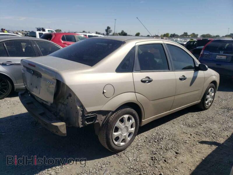 2006 Ford FOCUS (VIN 1FAFP34N46W212909) — photo 3 of 12