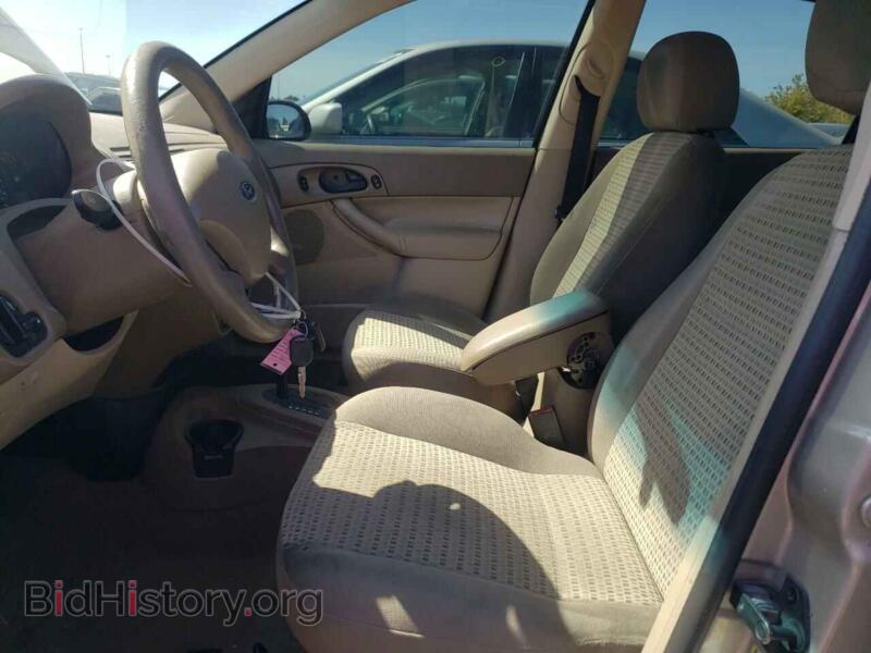 2006 Ford FOCUS (VIN 1FAFP34N46W212909) — photo 7 of 12