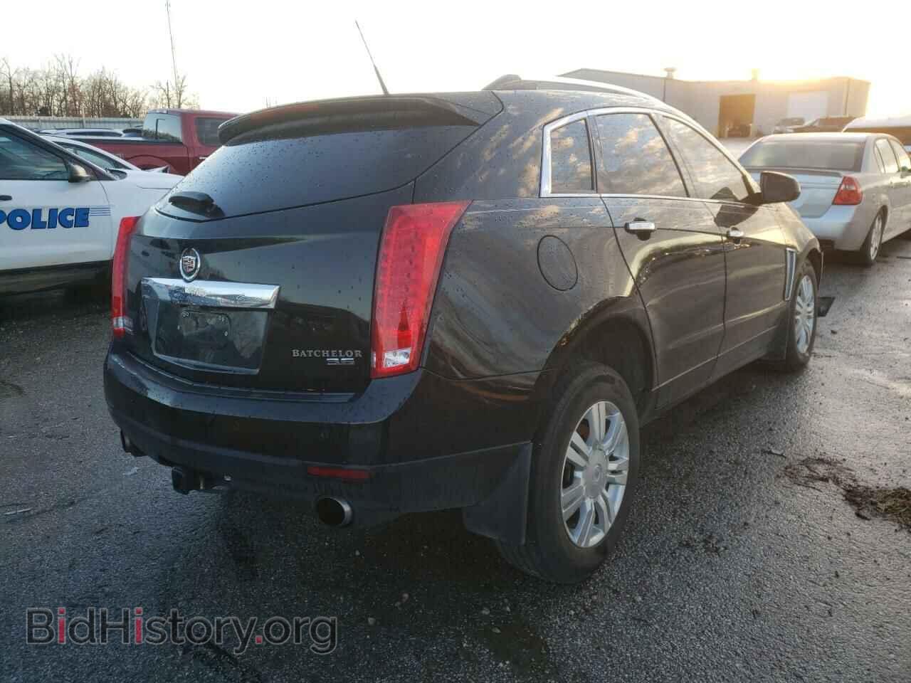2013 CADILLAC SRX - VIN: 3GYFNCE33DS596097 - Фото 4