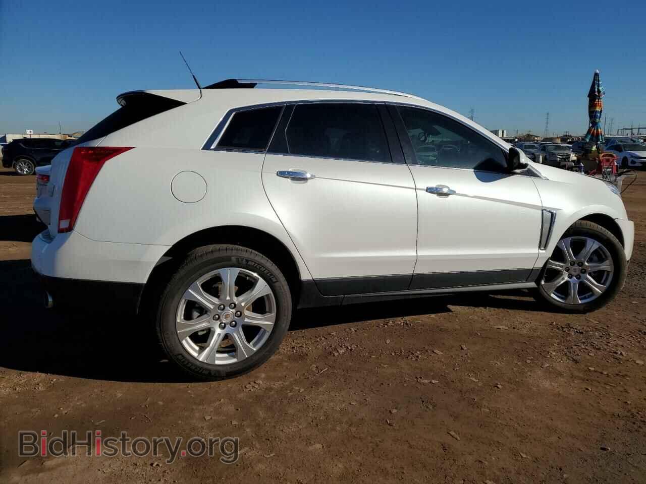 2014 CADILLAC SRX - VIN: 3GYFNCE3XES586085 - Фото 3