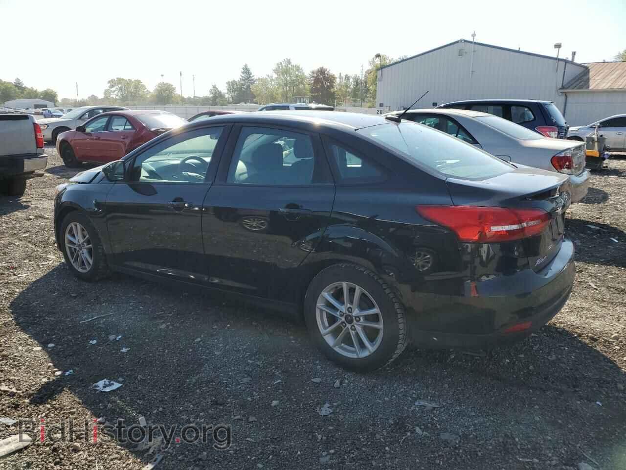 2016 FORD FOCUS - VIN: 1FADP3F21GL374624 - Фото 2