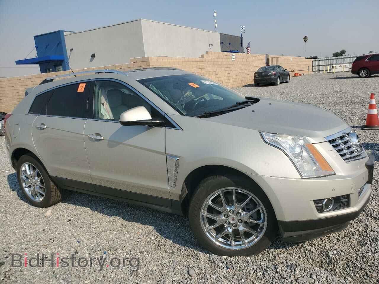 2014 CADILLAC SRX - VIN: 3GYFNDE34ES521870 - Фото 4
