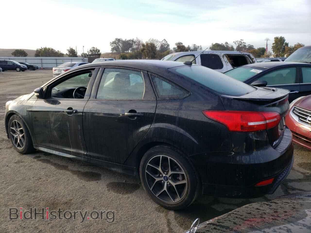 2015 FORD FOCUS - VIN: 1FADP3F22FL386201 - Photo 2