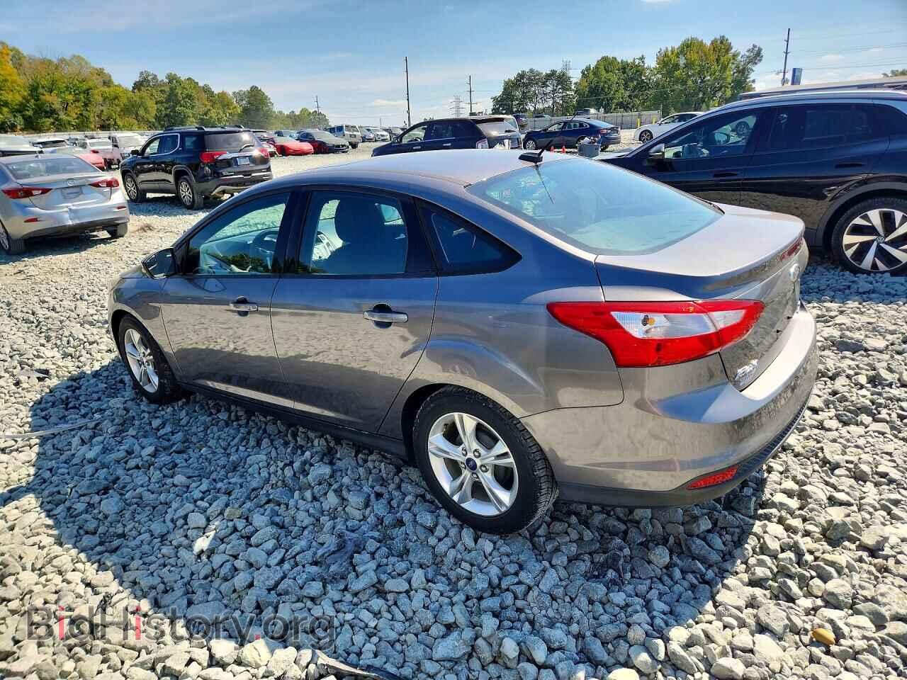 2014 Ford FOCUS (VIN 1FADP3F2XEL268377) — фото 2 из 13
